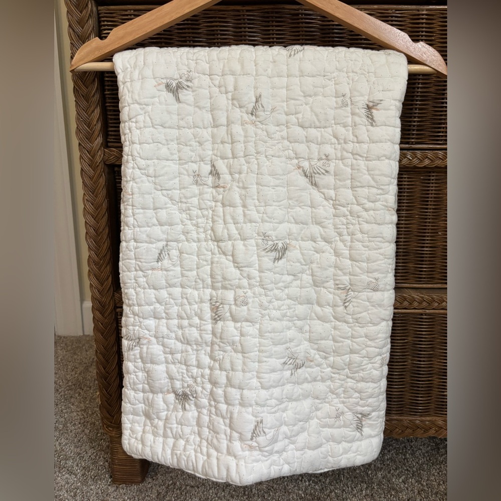 Cream Quilt with stork design